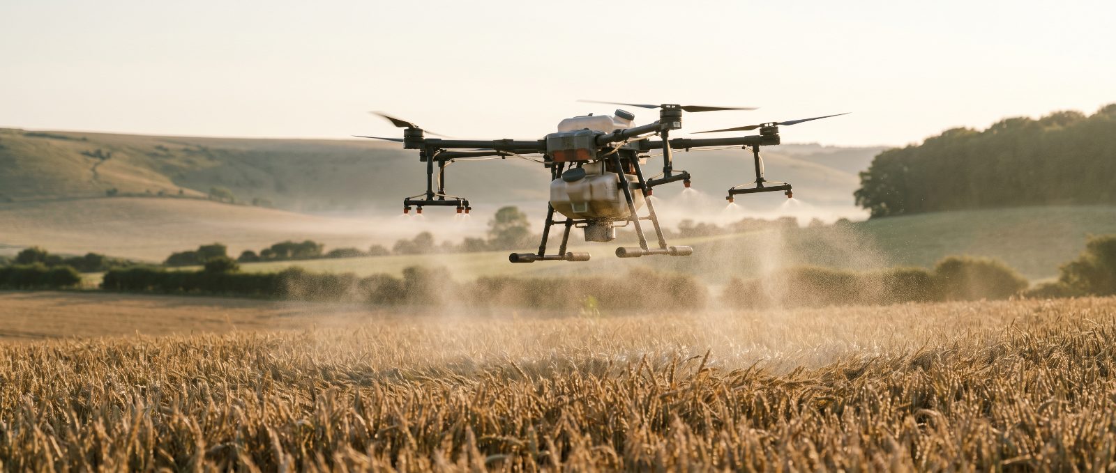 Agricultural spray drone working over Sussex farmland
